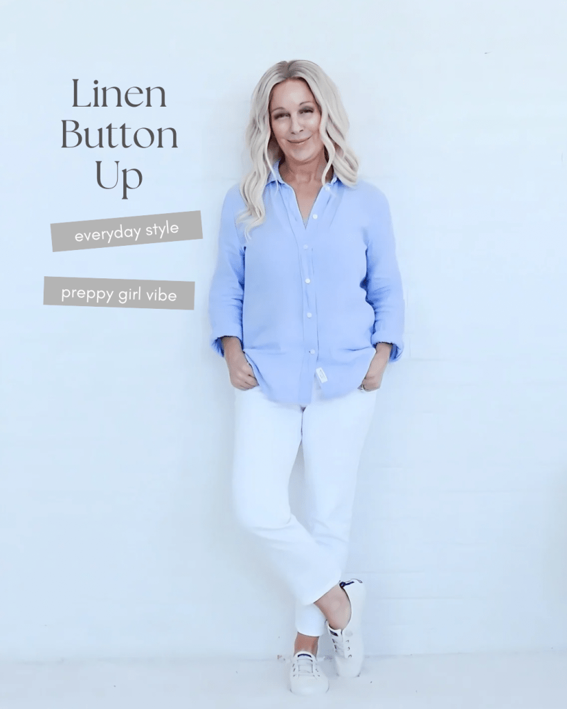 A woman wearing a light blue linen button-up shirt and white pants, standing against a white background with a relaxed pose. Text overlay reads 'Linen Button Up' with phrases 'everyday style' and 'preppy girl vibe'.